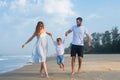 Happy family on vacation, mom, dad, son. baby on daddy`s shoulders