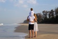 Happy family on vacation, mom, dad, son. baby on daddy`s shoulders