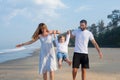 Happy family on vacation, mom, dad, son. baby on daddy`s shoulders