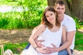 Happy family on vacation near the lake on a sunny day Royalty Free Stock Photo