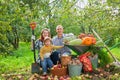 Happy family with vegetables harvest