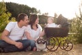 Happy family with vintage pram Royalty Free Stock Photo