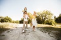 Happy Family Walking In Countryside Spending Day Outside Near River Royalty Free Stock Photo