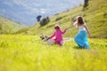 Happy family walking with dog Royalty Free Stock Photo