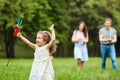 Happy family walking playing in the park Royalty Free Stock Photo