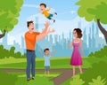 Happy Family Walking Playing in Summer City Park Royalty Free Stock Photo