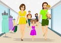 Happy family walking with shopping bags in supermarket. Young parents, mother and father with their son and daughter