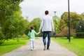 Happy family walking in summer park Royalty Free Stock Photo