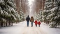 Happy family walking in winter forest. Father, mother and son walking in snowy forest Royalty Free Stock Photo