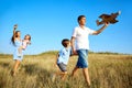 Happy family walks on nature in summer. Royalty Free Stock Photo