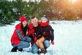 Happy family in warm clothes in the winter outdoors. Concept of holidays, holidays, winter, new year, day of grace. Family Royalty Free Stock Photo