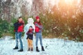 Happy family in warm clothes in the winter outdoors. Concept of holidays, holidays, winter, new year, day of grace. Family Royalty Free Stock Photo