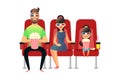 Happy family watching movie in the cinema. Mom, Dad and daughter in 3d glasses. A man, a woman and a girl sit on the