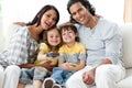 Happy family watching TV together Royalty Free Stock Photo