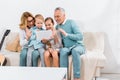 happy family waving by hands while having video call with digital tablet