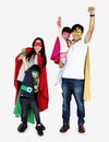 Happy family wearing superhero costumes Royalty Free Stock Photo