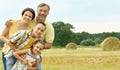 Happy family in wheat field Royalty Free Stock Photo