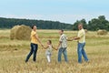 Happy family in wheat field Royalty Free Stock Photo