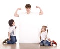 Happy family with white banner. Royalty Free Stock Photo