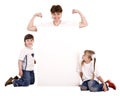 Happy family with white banner. Royalty Free Stock Photo