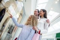 Happy family window shopping in mall Royalty Free Stock Photo