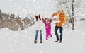 Happy family in winter clothes walking outdoors Royalty Free Stock Photo