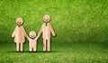 Happy family wood icon on green leaf wall,Eco concept Royalty Free Stock Photo