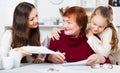 Happy family working with papers Royalty Free Stock Photo