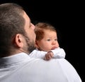 Happy family young father and new born infant child baby girl kissing Royalty Free Stock Photo