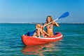 Happy family - young mother, children have fun on boat walk Royalty Free Stock Photo