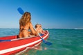 Happy family - young mother, children have fun on boat walk Royalty Free Stock Photo