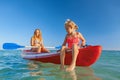 Happy family - young mother, children have fun on boat walk Royalty Free Stock Photo