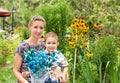 Happy family. Young mother and kid boy on sunny day. Portrait mom and son on nature. Positive human emotions, feelings, joy. Royalty Free Stock Photo