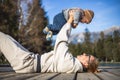 Happy family. Young mother playing with her baby boy infant oudoors on sunny autumn day. Portrait of mom and little son Royalty Free Stock Photo