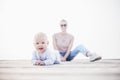 Happy family. Young mother playing with her baby boy infant oudoors on sunny autumn day. Portrait of mom and little son Royalty Free Stock Photo