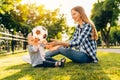 Happy family, young mother with toddler playing ball in the park Royalty Free Stock Photo