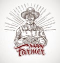 Happy farmer holding a handful of grain