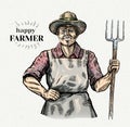Happy and smiling farmer with a pitchfork
