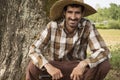 Happy Farmer With Wicker Hat and Cutting Knife at Hands