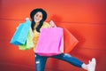 Happy fashion Asian woman doing shopping in mall center - Young Chinese girl having fun buying new clothes Royalty Free Stock Photo