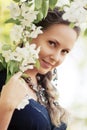 Happy fashion beautiful woman in a spring garden Royalty Free Stock Photo
