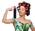 happy fashion brunette woman with big black hair spray and curler roller Royalty Free Stock Photo