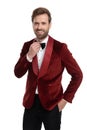 Happy fashion man wearing red velvet tuxedo Royalty Free Stock Photo