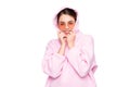 Happy fashion woman in stylish glasses wearing casual pink hoodie hooded sweatshirt