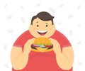 Happy fat man eating a big hamburger Royalty Free Stock Photo