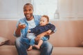 Happy father babysitting his child Royalty Free Stock Photo