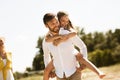 Happy Father Carrying Daughter Going On Family Picnic In Countryside Royalty Free Stock Photo