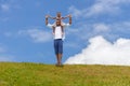 Happy father carrying daughter on shoulders, Cheerful african american girl on the shoulders of his father Royalty Free Stock Photo