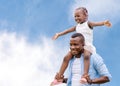 Happy father carrying daughter on shoulders, Cheerful african american girl on the shoulders of his father with clipping path Royalty Free Stock Photo