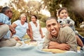 Happy, father and child on a picnic at a park with family for food, adventure and love on a holiday in Germany together Royalty Free Stock Photo